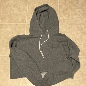 The size extra large color is gray and it is a cropped hoodie